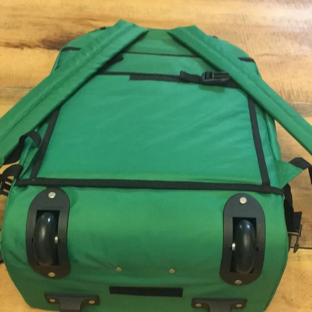 Jameson Green Travel Backpack with wheels and a retractable handle